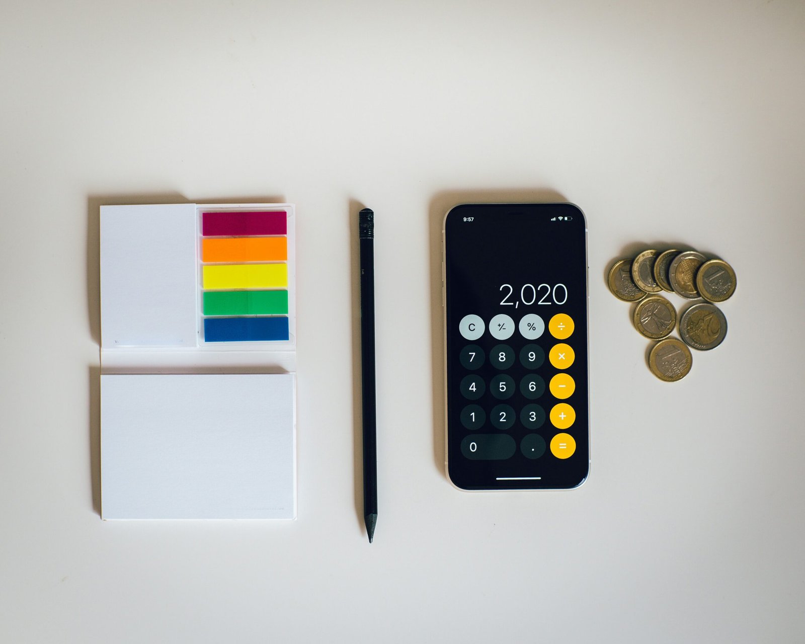 iPhone calculator and notes beside it