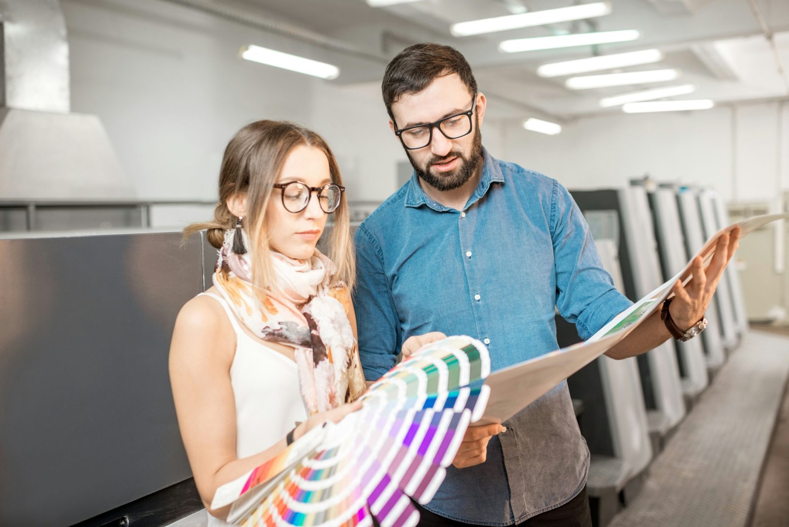 Man and woman looking at colours choosing between them