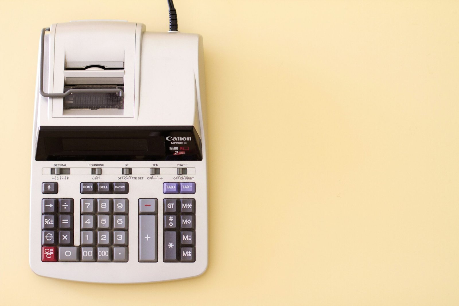 Old school calculator showing calculations for ISAs