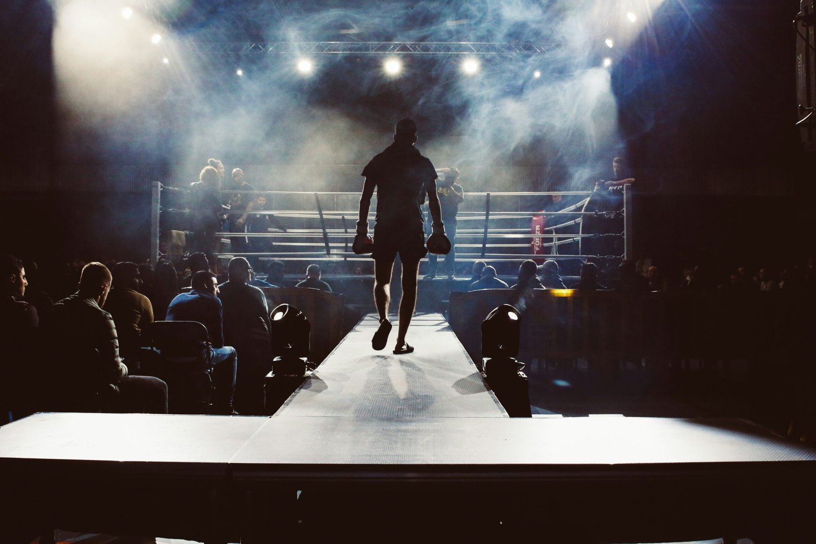 A boxer entering a ring - showing a fight with inflation