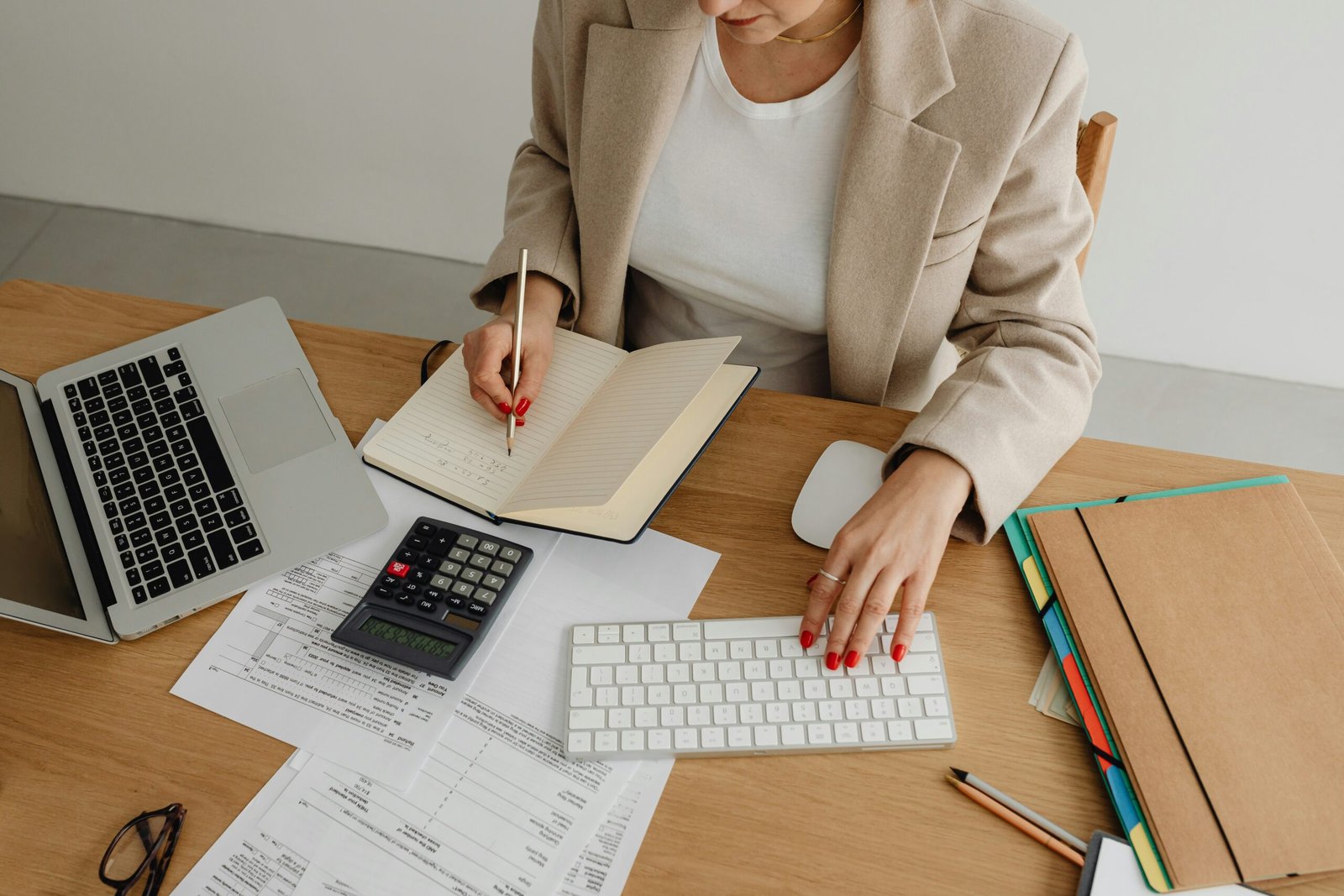Woman counting numbers at a desk